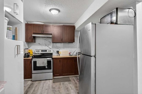 49 Taravista Way Ne, Calgary, AB - Indoor Photo Showing Kitchen