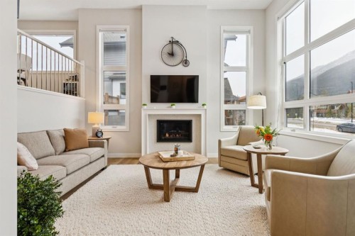 1348 Three Sisters Parkway, Canmore, AB - Indoor Photo Showing Living Room With Fireplace