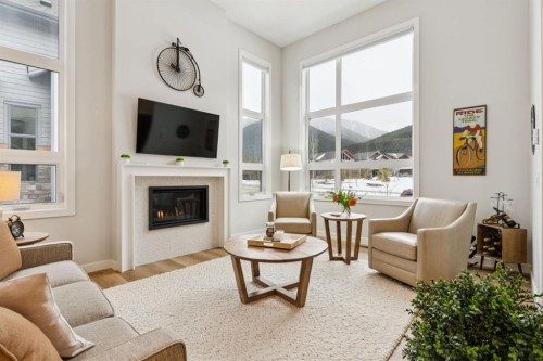 1348 Three Sisters Parkway, Canmore, AB - Indoor Photo Showing Living Room With Fireplace