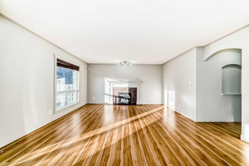 1156 Sherwood Boulevard Nw, Calgary, AB - Indoor With Fireplace