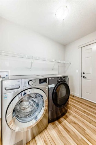 1156 Sherwood Boulevard Nw, Calgary, AB - Indoor Photo Showing Laundry Room
