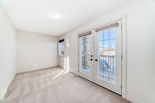 1156 Sherwood Boulevard Nw, Calgary, AB - Indoor Photo Showing Other Room