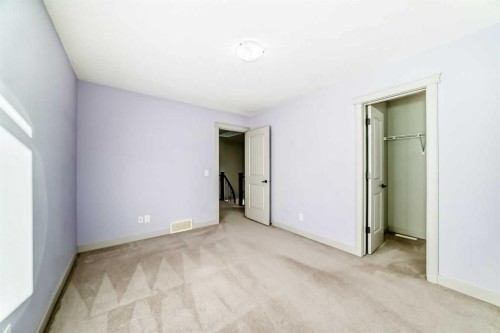 1156 Sherwood Boulevard Nw, Calgary, AB - Indoor Photo Showing Other Room