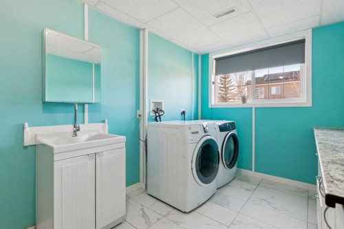 100B Westview Drive, Nanton, AB - Indoor Photo Showing Laundry Room