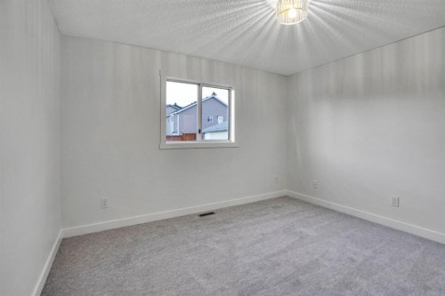 96 Covington Road Ne, Calgary, AB - Indoor Photo Showing Other Room