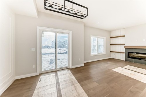 504 Heritage Boulevard, Cochrane, AB - Indoor With Fireplace