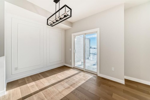 504 Heritage Boulevard, Cochrane, AB - Indoor Photo Showing Other Room