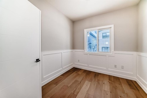 504 Heritage Boulevard, Cochrane, AB - Indoor Photo Showing Other Room