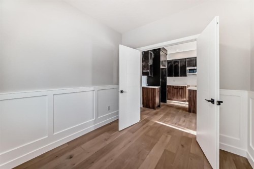 504 Heritage Boulevard, Cochrane, AB - Indoor Photo Showing Other Room