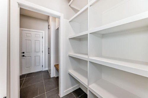 504 Heritage Boulevard, Cochrane, AB - Indoor With Storage