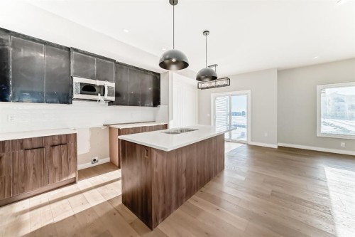 504 Heritage Boulevard, Cochrane, AB - Indoor Photo Showing Kitchen