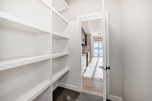 504 Heritage Boulevard, Cochrane, AB - Indoor With Storage