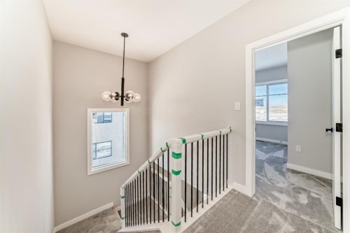 504 Heritage Boulevard, Cochrane, AB - Indoor Photo Showing Other Room