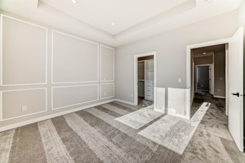 504 Heritage Boulevard, Cochrane, AB - Indoor Photo Showing Other Room