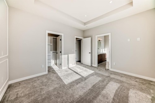 504 Heritage Boulevard, Cochrane, AB - Indoor Photo Showing Other Room