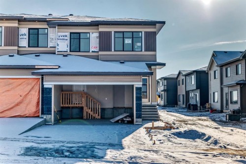 504 Heritage Boulevard, Cochrane, AB - Outdoor With Facade