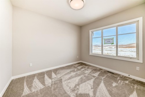 504 Heritage Boulevard, Cochrane, AB - Indoor Photo Showing Other Room