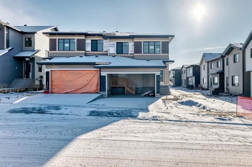 504 Heritage Boulevard, Cochrane, AB - Outdoor With Facade