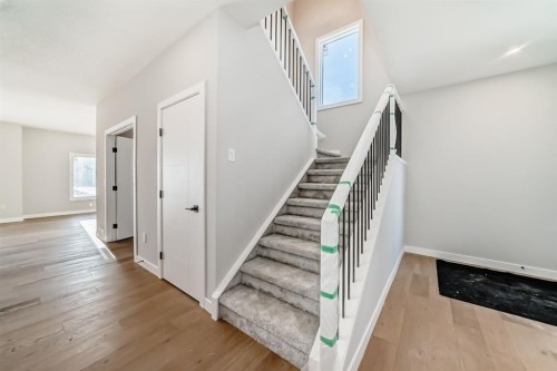 504 Heritage Boulevard, Cochrane, AB - Indoor Photo Showing Other Room