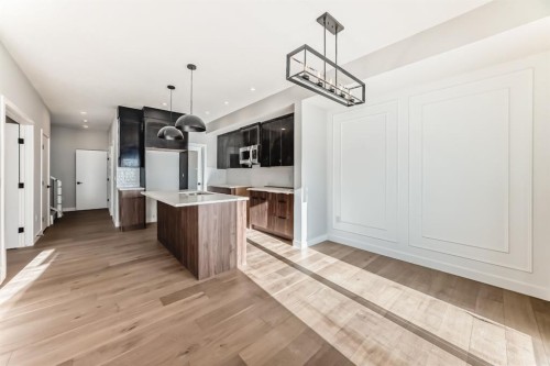 504 Heritage Boulevard, Cochrane, AB - Indoor Photo Showing Kitchen