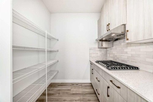 100 Corner Glen Manor Ne, Calgary, AB - Indoor With Storage