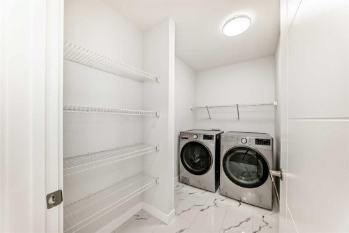 100 Corner Glen Manor Ne, Calgary, AB - Indoor Photo Showing Laundry Room