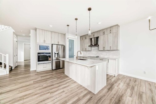 100 Corner Glen Manor Ne, Calgary, AB - Indoor Photo Showing Kitchen With Stainless Steel Kitchen With Upgraded Kitchen