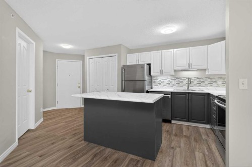 1408-1000 Somervale Court Sw, Calgary, AB - Indoor Photo Showing Kitchen With Upgraded Kitchen