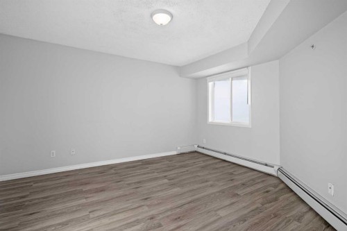 1408-1000 Somervale Court Sw, Calgary, AB - Indoor Photo Showing Other Room