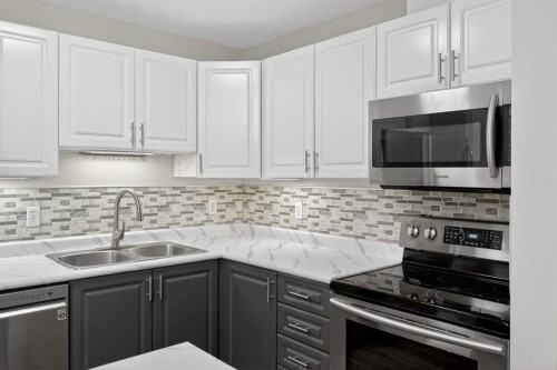 1408-1000 Somervale Court Sw, Calgary, AB - Indoor Photo Showing Kitchen With Double Sink With Upgraded Kitchen