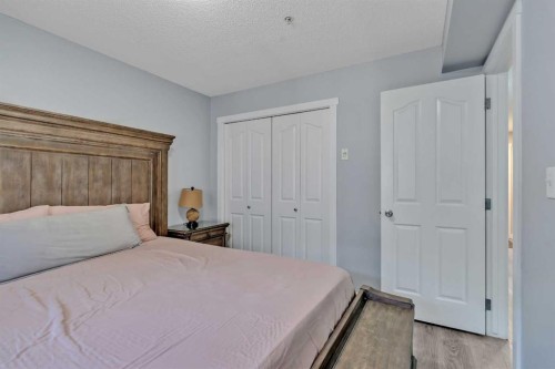 117-7130 80 Avenue Ne, Calgary, AB - Indoor Photo Showing Bedroom