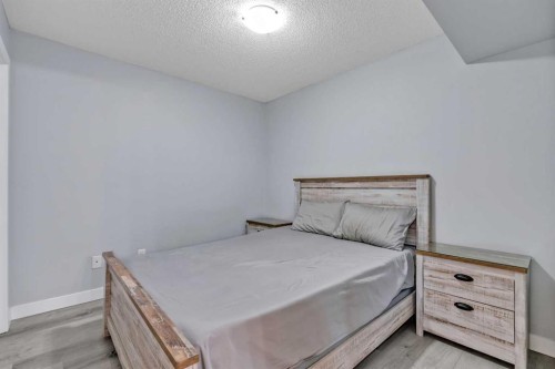 117-7130 80 Avenue Ne, Calgary, AB - Indoor Photo Showing Bedroom