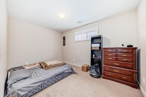 226 Saddlebrook Circle Ne, Calgary, AB - Indoor Photo Showing Bedroom
