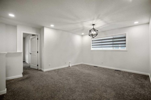 223 Savanna Way Ne, Calgary, AB - Indoor Photo Showing Other Room