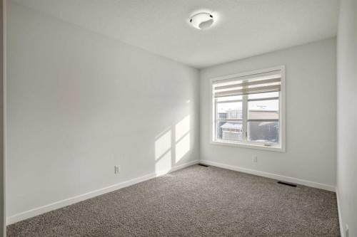 223 Savanna Way Ne, Calgary, AB - Indoor Photo Showing Other Room