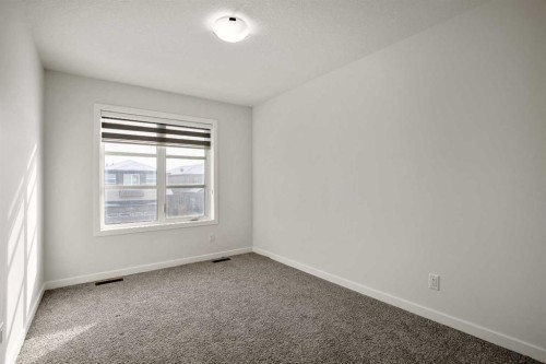 223 Savanna Way Ne, Calgary, AB - Indoor Photo Showing Other Room