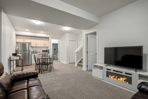 223 Savanna Way Ne, Calgary, AB - Indoor Photo Showing Living Room