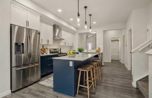 223 Savanna Way Ne, Calgary, AB - Indoor Photo Showing Kitchen With Upgraded Kitchen