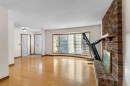 20 Templehill Crescent, Calgary, AB  - Indoor Photo Showing Other Room With Fireplace 