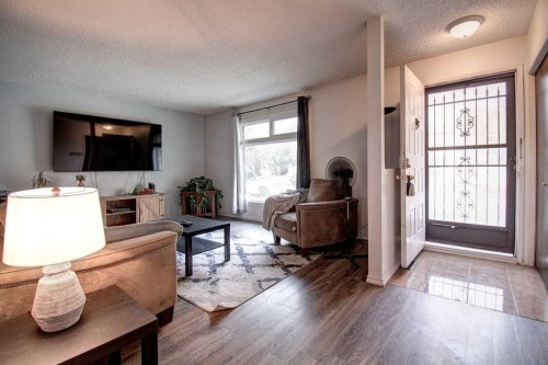 95 Falton Way Ne, Calgary, AB - Indoor Photo Showing Living Room