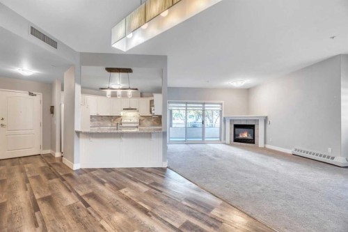 112-43 Westlake Circle, Strathmore, AB - Indoor With Fireplace