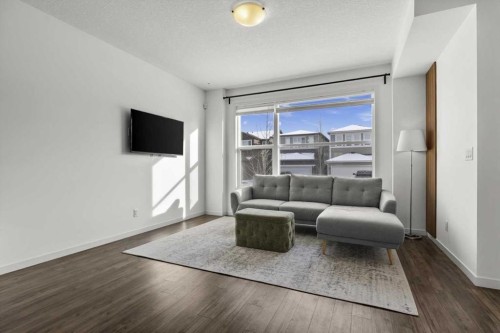 59 Wolf Hollow Way Se, Calgary, AB - Indoor Photo Showing Living Room
