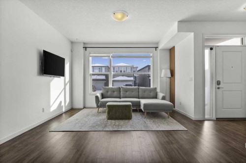 59 Wolf Hollow Way Se, Calgary, AB - Indoor Photo Showing Living Room