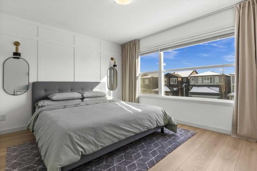 59 Wolf Hollow Way Se, Calgary, AB - Indoor Photo Showing Bedroom