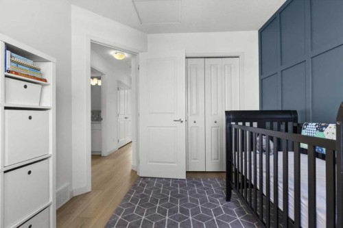 59 Wolf Hollow Way Se, Calgary, AB - Indoor Photo Showing Bedroom