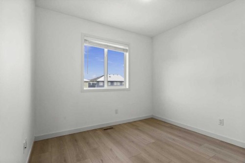 59 Wolf Hollow Way Se, Calgary, AB - Indoor Photo Showing Other Room