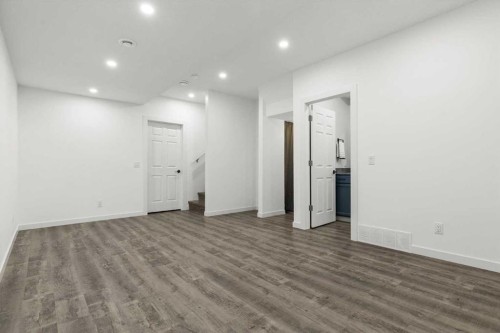 59 Wolf Hollow Way Se, Calgary, AB - Indoor Photo Showing Other Room