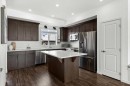59 Wolf Hollow Way Se, Calgary, AB  - Indoor Photo Showing Kitchen With Stainless Steel Kitchen With Upgraded Kitchen 