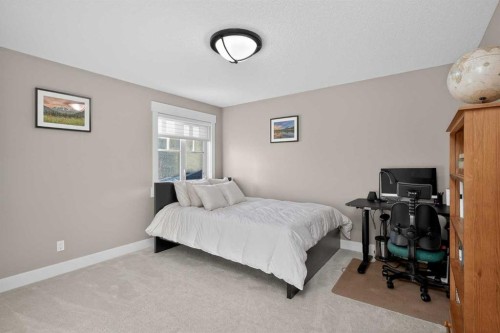 72 Rockcliff Grove Nw, Calgary, AB - Indoor Photo Showing Bedroom