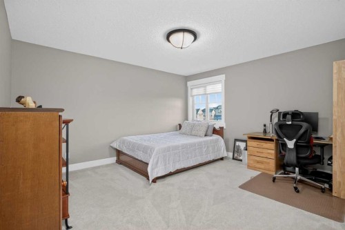72 Rockcliff Grove Nw, Calgary, AB - Indoor Photo Showing Bedroom